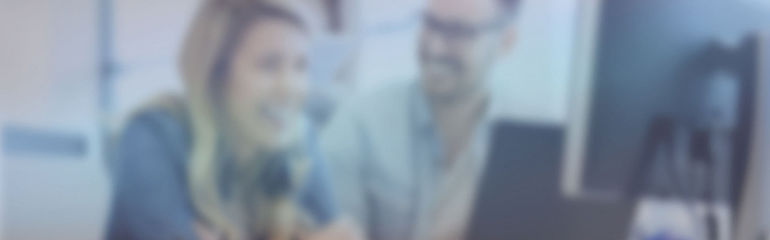 supplier portal_applications_header smiling persons sitting side by side