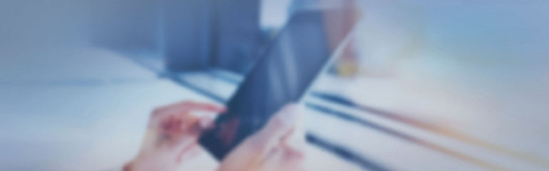 supplier portal_supplier performance assessment_header hands with tablet PC
