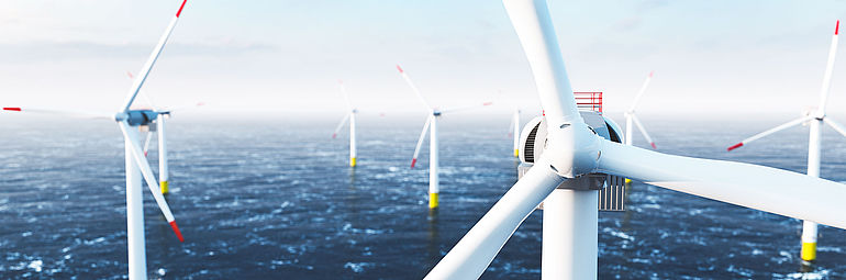 offshore wind turbines in the sea produce renewable energy