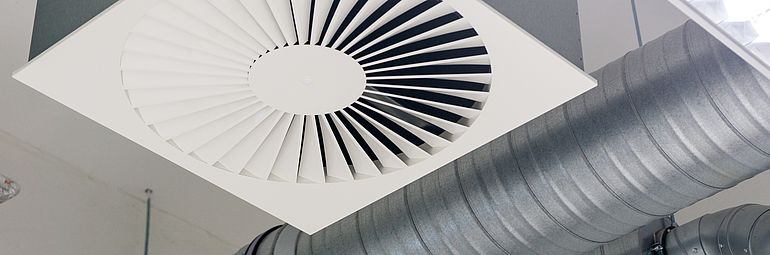 ceiling ventilation system with white grid