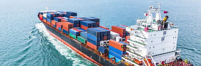 Loaded container ship on the ocean