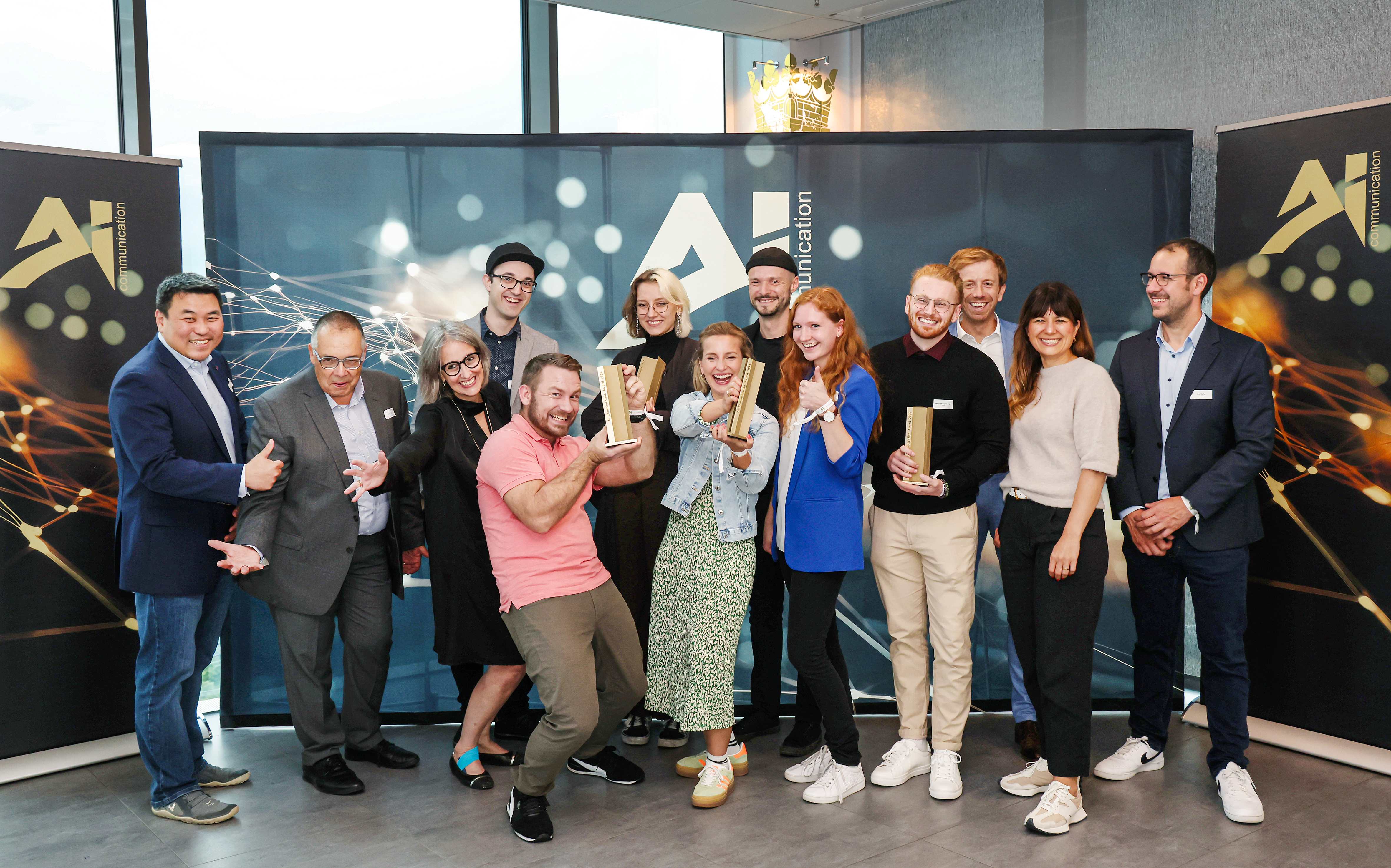 Funny picture of the winners & jury members of the AI Communication Awards
